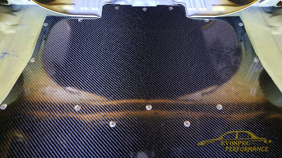EVO 7/8/9 Carbon Fiber Trunk Delete Panel / Spare Tire Delete image 0